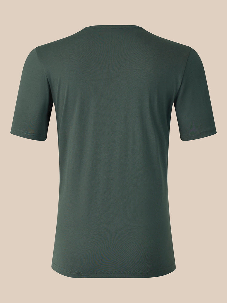 A dark green short-sleeve crewneck t-shirt shown from the back, displayed on a solid beige background.