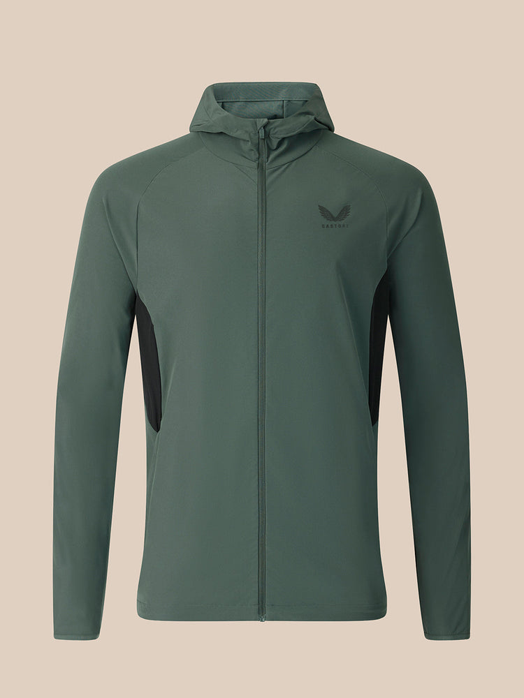 Dark green jacket on a beige background