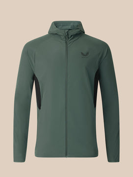 Dark green jacket on a beige background