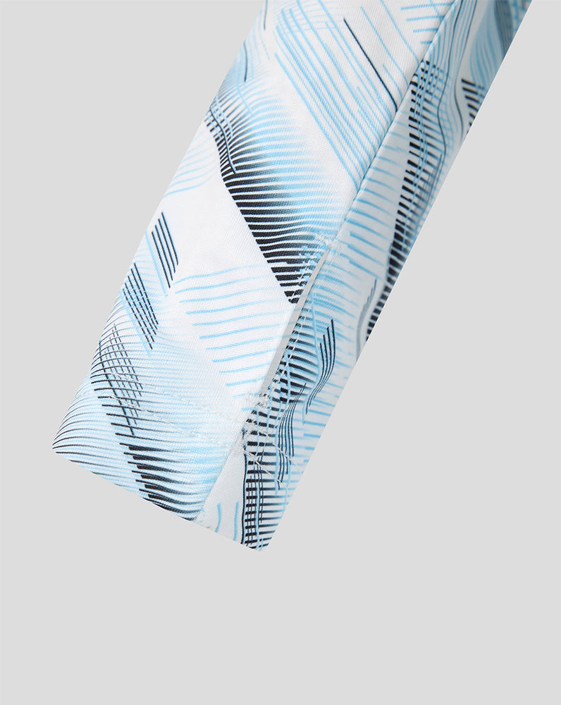 Sleeve close up of the Feyenoord Uit Matchday 2026-2027 Junior midlayer top featuring blue and black abstract pattern