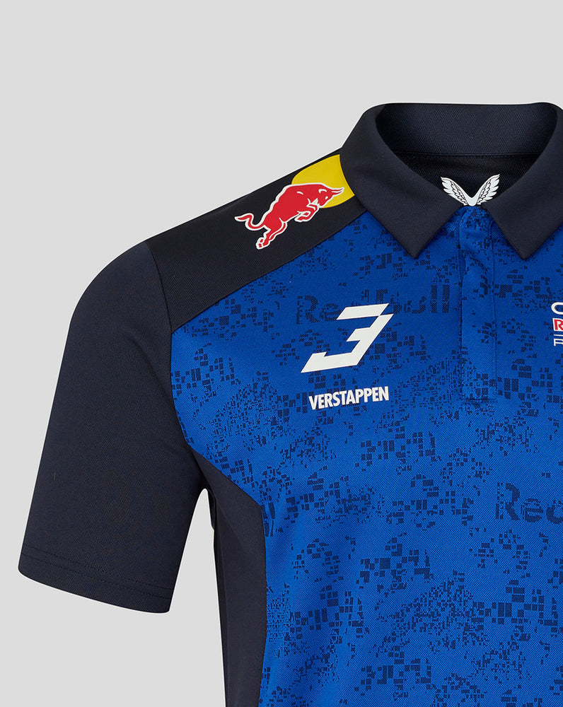 Blue and black sports jersey with branding on a gray background