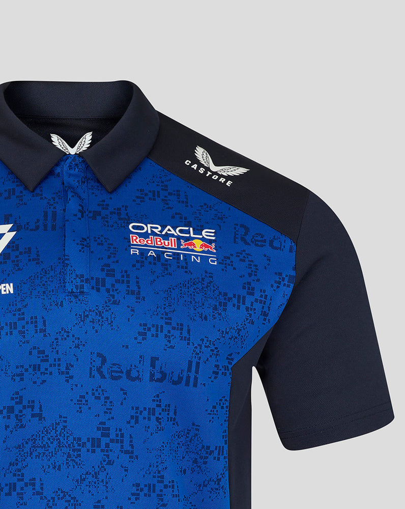 Blue and black polo shirt with Oracle Red Bull Racing logos on a gray background